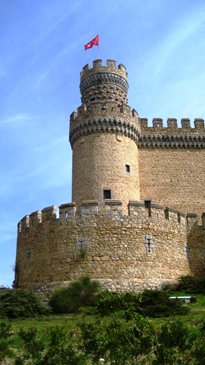 Pictured is the Castillo de Manzanares el Real near Madrid, Spain.  Construction on it began in 1475 when Madrid was a relatively small outpost; it is a classic example of 15th century "military" Spanish architecture.